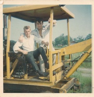 Lee's brother Lonz operates a machine while working on the railway