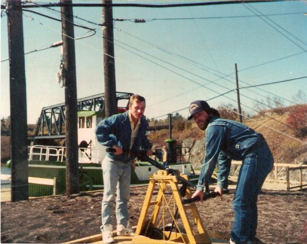 CP Rail Workers Ron Smith, Lorne Murphy operating a machine on a CP Rail site