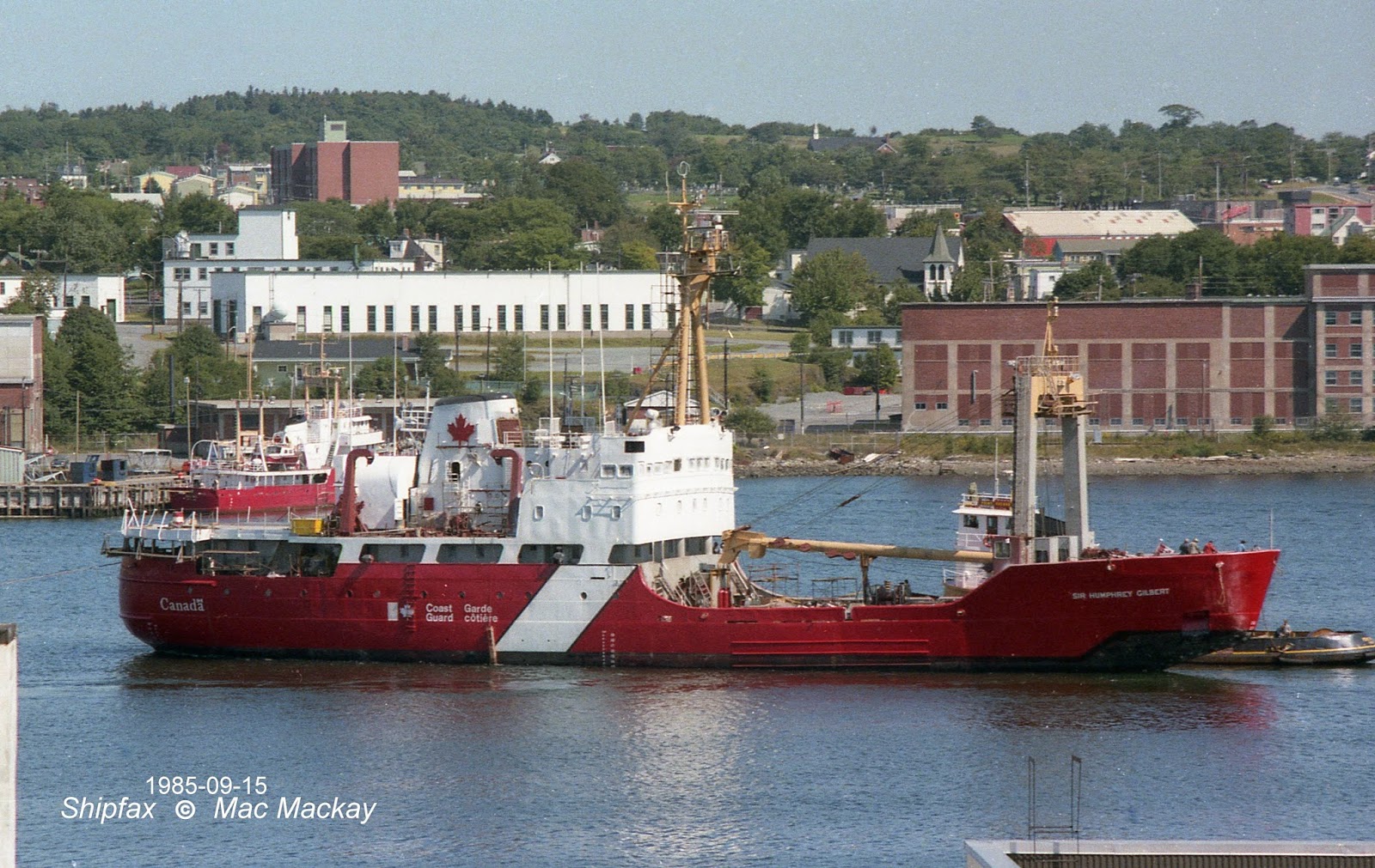 Coast Guard Ship-- Sir Humphrey Gilbert in the harbour. City view in the background