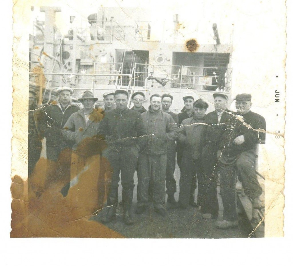 Period photo of Mike Dicks and other crew members from Rushoon on the deck of their ship