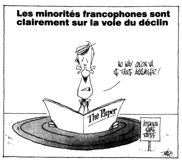 alt= Translated from original French artwork. Title: Francophone minorities are clearly declining Illustration: A man stuck in quicksand up to his waist, is holding a newspaper and saying: No way we’re going to be assimilated!