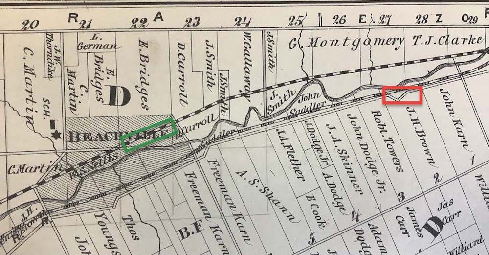 A map of land lots 20 to 29 north of a river and Lots 1 to 5 south of a river, A red rectangle and green rectangle mark land in lots 2 and 22