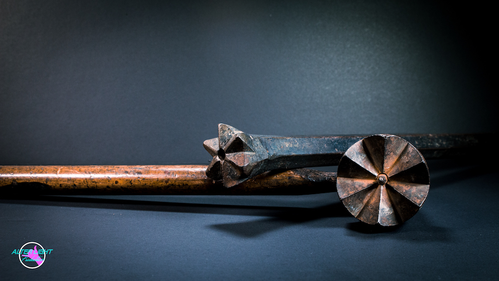 A colour photograph of a set of hand tools made of wood and iron