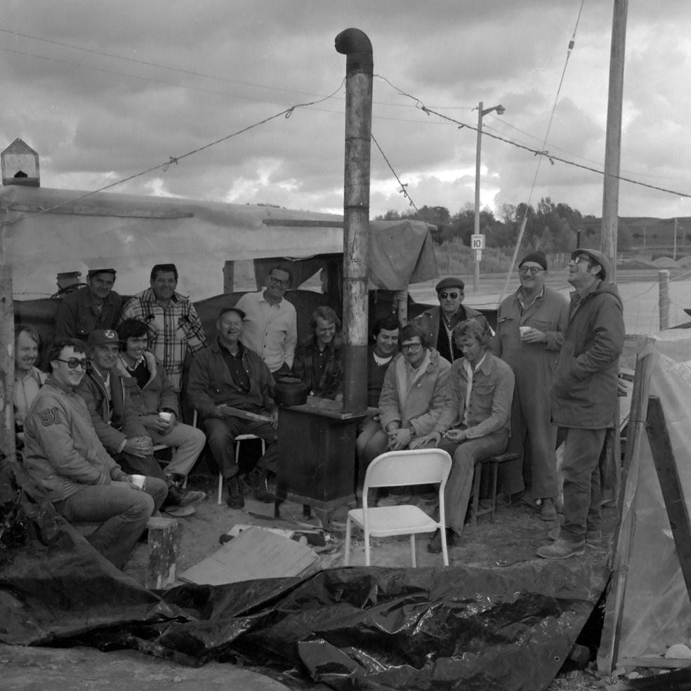 Domtar Strikers around the stove in a self-built shack