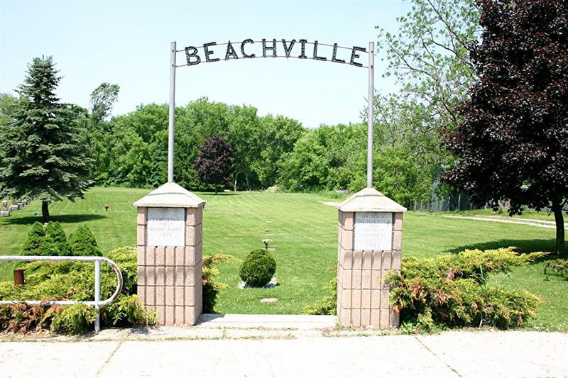 Entrance to the Beachville Cemetery with an arbour that spells out 