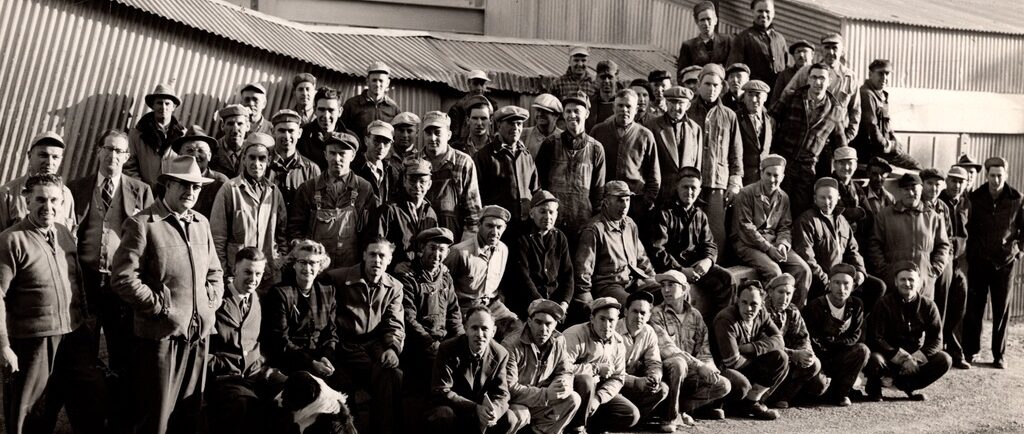 A group of workers outside of the quarry