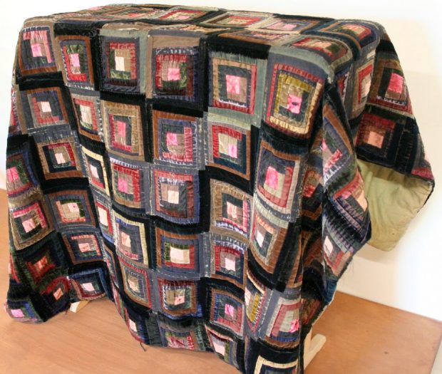 Colour photograph of a log cabin quilt, made by one of George Leek's descendants.