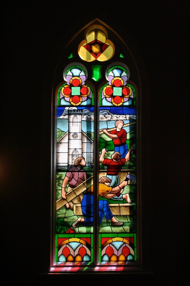 Colour photograph of a stained-glass window in St. Peter's Church.