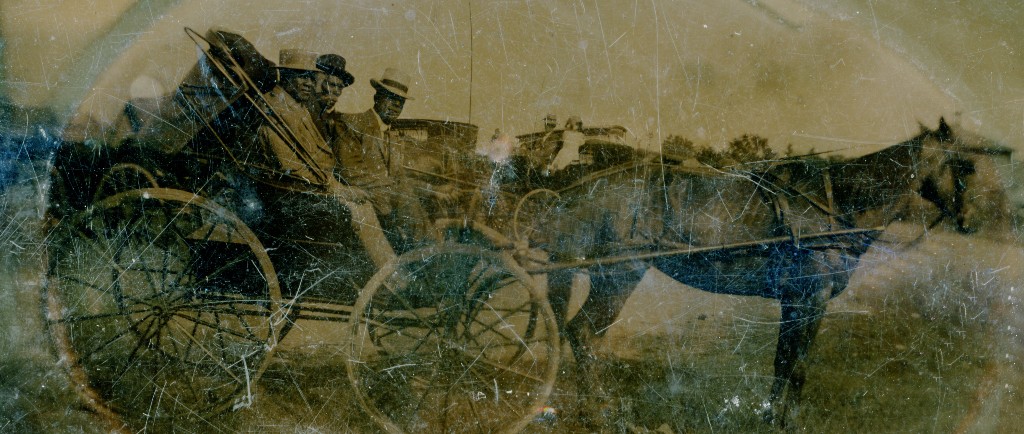 Tin photo circa 1900 depicting Solomon Kendall 2nd alongside one Black man and white man in a horse drawn carriage.