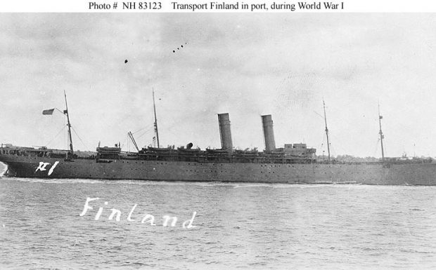 A side view of a large, two-masted ship.