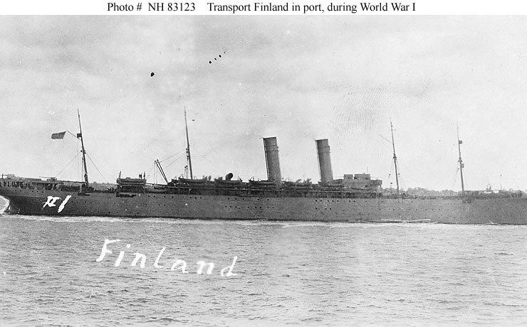 A side view of a large, two-masted ship.