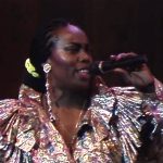 Amanda Hughes Performs “Reach for the Sky”
