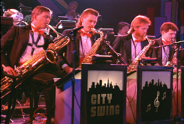 Four musicians in the brass section of the 18-piece big band group, City Swing Band, at Swing '90 at the Commodore Ballroom, August 6, 1990.