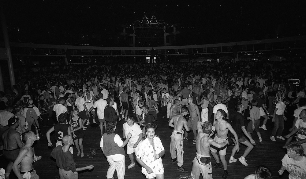 A crowded disco evening at Celebration Centre's Plaza of Nations.