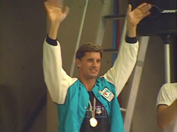 Michael Mealiffe waves to the crowd as he prepares to receive his gold medal.