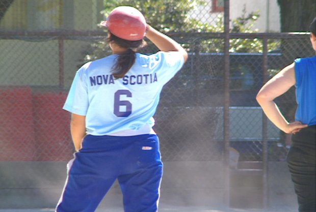 A woman softball player from the Nova Scotia team.