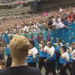The Crowd Welcomes the Athletes