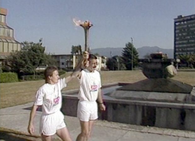 Torch bearers Penny O’Neil and Kent Knutsen start their run to B.C. Place Stadium from The Flame of Peace, Seaforth Park.