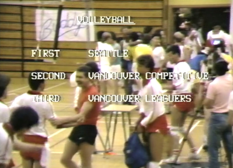 Results of the VGSG Volleyball Tournament are broadcast over an video image of the tournament.