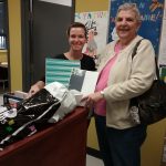 Madeleine Cadieux delivers school supplies on behalf of the Fermières de Saint-Eustache