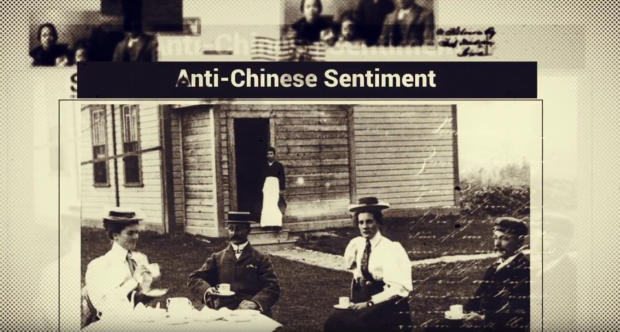 Video still featuring black and white photographs with text reading Anti-Chinese Sentiment.