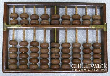 Wood abacus with 9 bars holding 63 wood beads