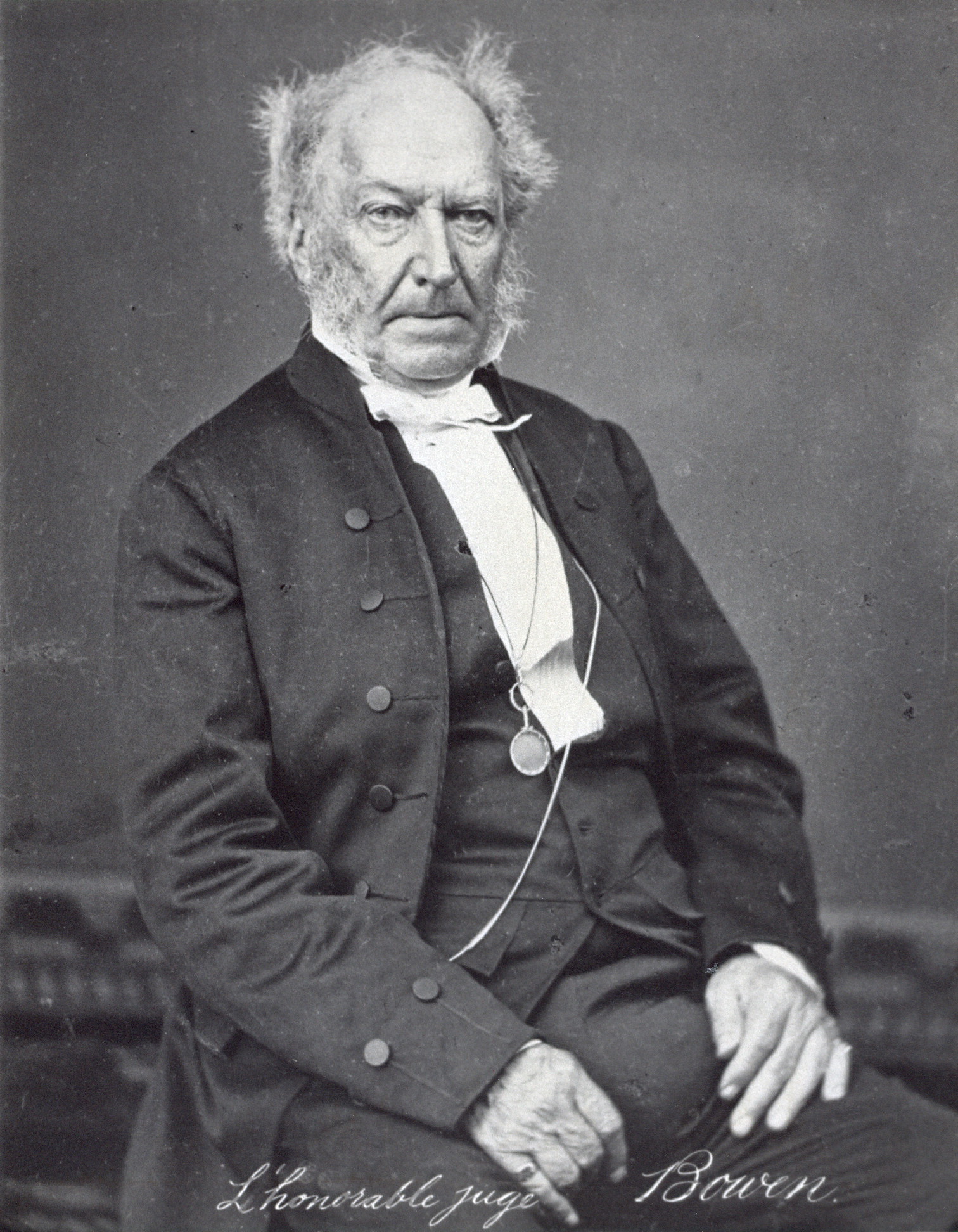 Black white. Older man in a black suit and a white shirt.