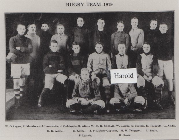 Black and White picture of a group of boys dressed in their sports uniforms.