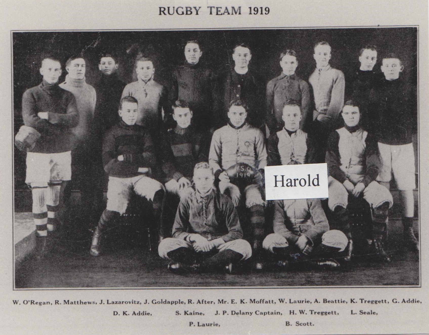 Black and White picture of a group of boys dressed in their sports uniforms.