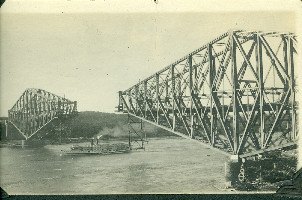 sepia photo of a bridge with no center span