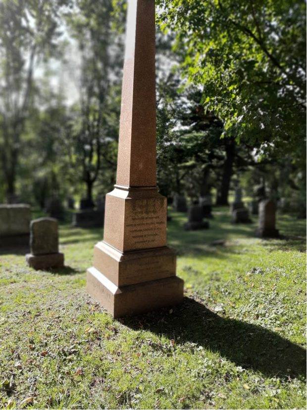 a long red stone monument