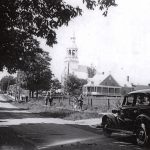 Main road of the Saint-Télesphore village around 1936