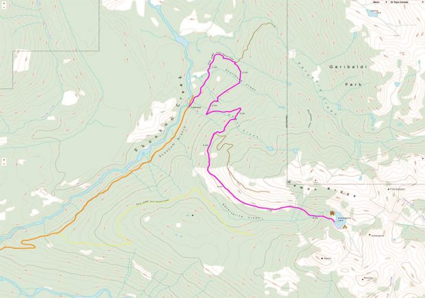 The map has a solid orange line indicating the road to the base of the trail and the trail is highlighted in a bright purple to Watersprite Lake.