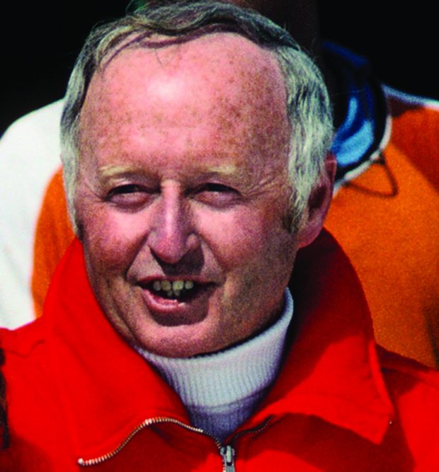 Portrait of a man wearing a red jacket