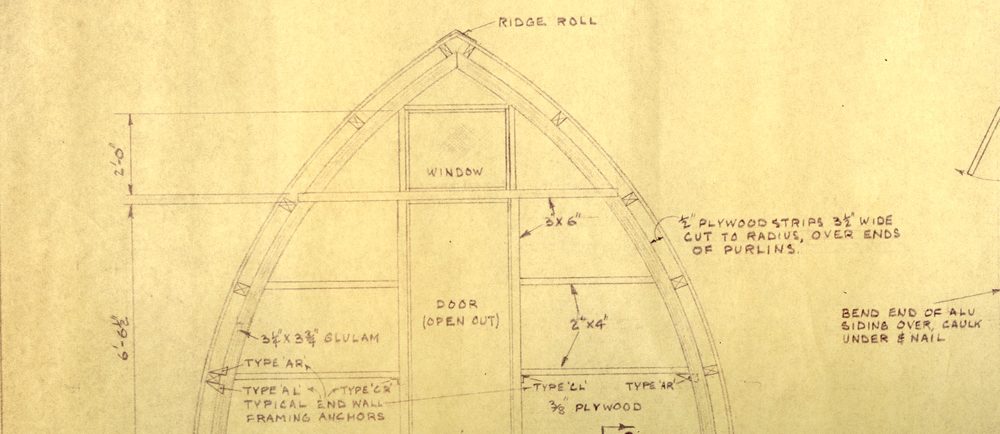 Part of the original technical drawing in black pen with specifics on the front entrance of the Gothic arch hut.