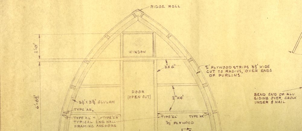 Part of the original technical drawing in black pen with specifics on the front entrance of the Gothic arch hut.