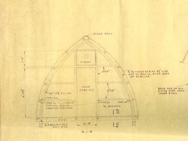 Part of the original technical drawing in black pen with specifics on the front entrance of the Gothic arch hut.