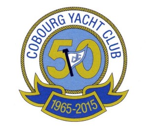 a logo made with a double circle of gold coloured ropes with the words Cobourg Yacht Club between, the years 1965-2015 in gold on blue at the bottom and a blue and white flag over a gold 50 on blue in the middle