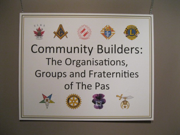 exhibit poster with a white background and black text and coloured symbols of the service groups represented in the exhibit