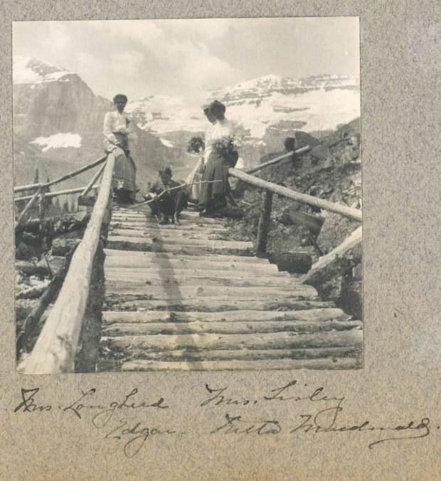 Photo of Isabella (left) on bridge in Banff with friends and her son Edgar.