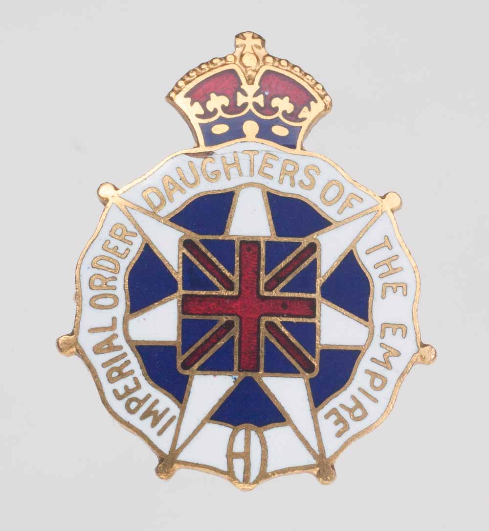 Enamel pin of the IODE with Union Jack in centre and crown on top.