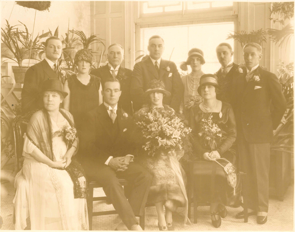 Photo group shot taken at Dorothy's wedding, Belle at left in front row.