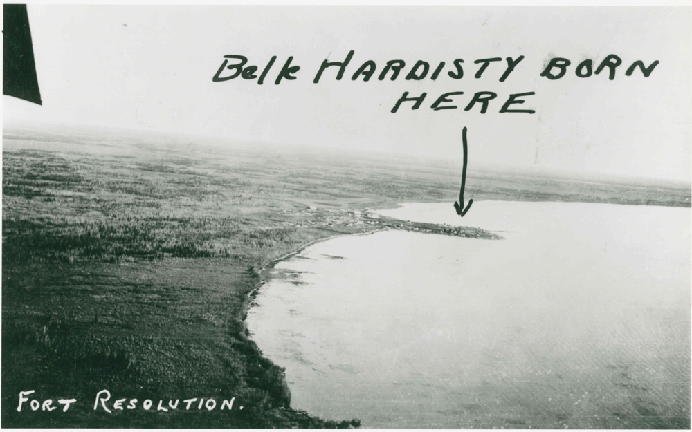 Aerial photo of Fort Resolution with hand written addition in black pen saying "Belle Hardisty born here" with an arrow