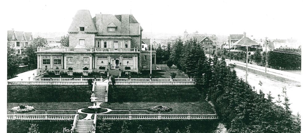 Photo of Beaulieu house and its formal gardens showing its prominent position in the neighbourhood