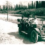 Members of the Lougheed family and friends in car on the road to Banff