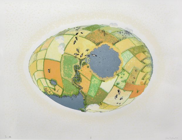 Aerial view of an egg shape covered in patchwork fields, lakes, and cows.