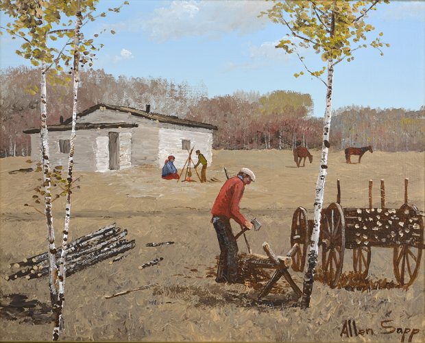 A man with an axe sharpening logs into pickets.