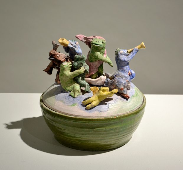 Ceramic bowl, lid has animals playing instruments.