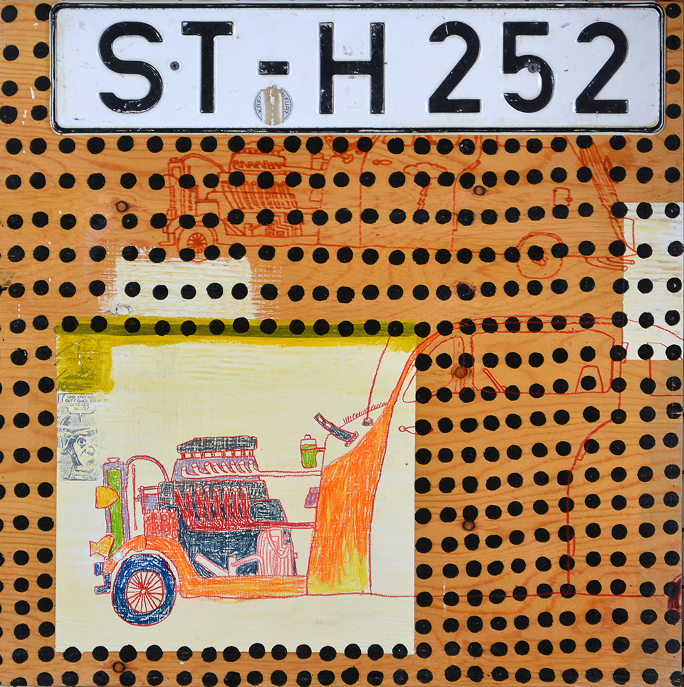 Drawing of a car engine on wood