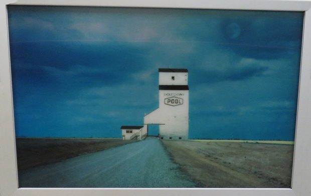 Grain elevator in a field